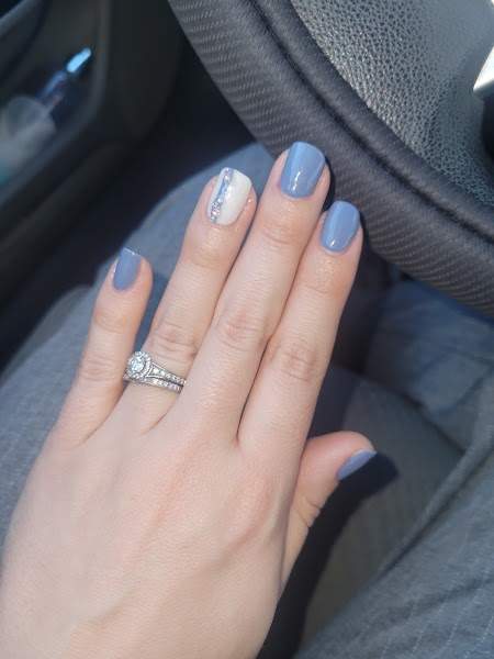 Dusty Blue Shimmer — Soft blue nails with silver accent