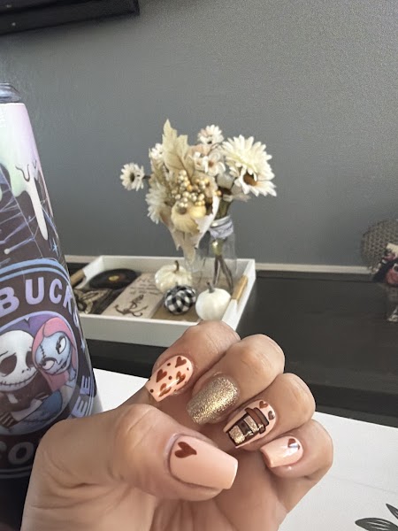 Pumpkin Spice — Fall-themed nails with coffee cup art